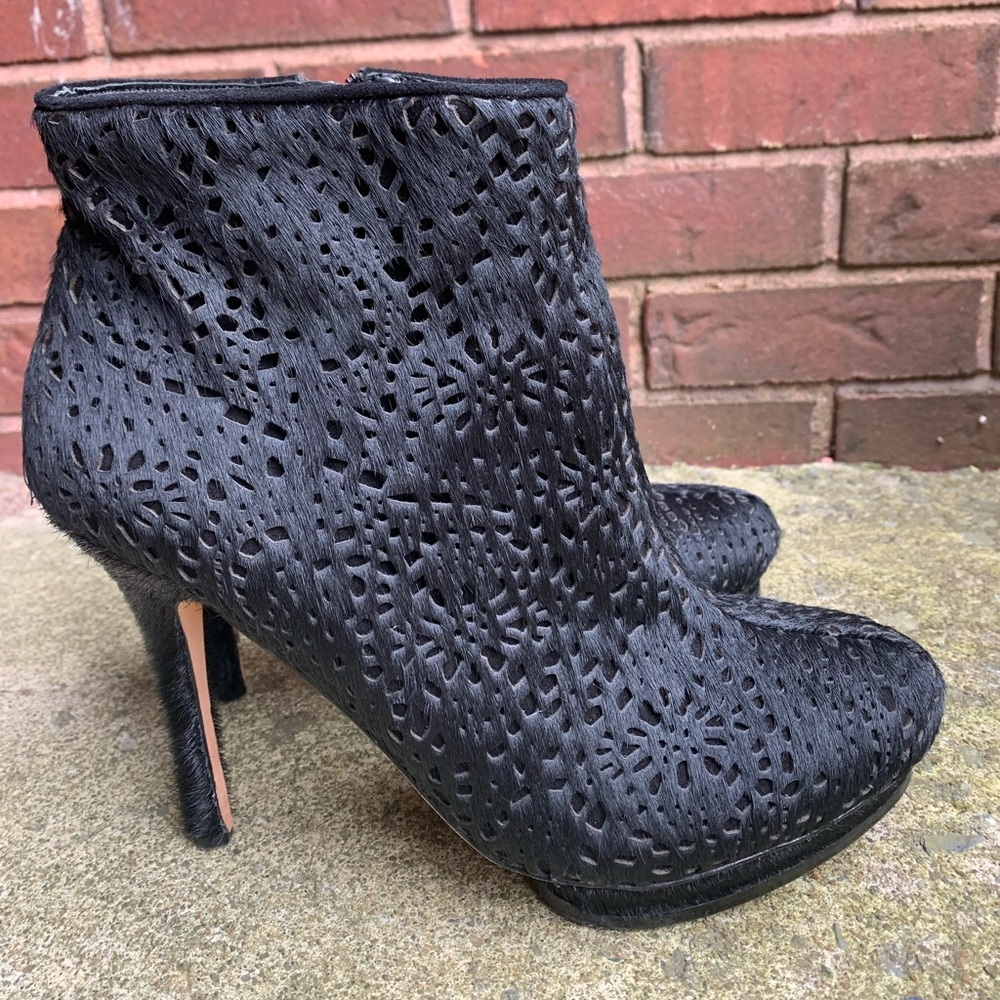 BCBG ankle bootie with platform Black pony hair laser cut details. Size 10